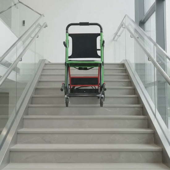 Stair climbing wheelchair operated by caregiver - video